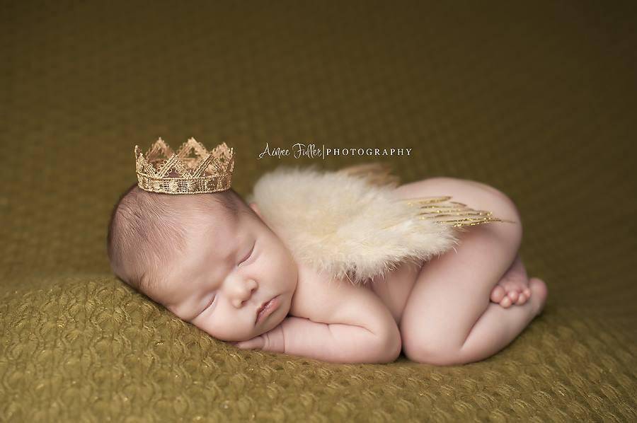 Newborn Baby Girl Wearing A Gold Crown Stock Photo - Download Image Now - Crown - Headwear, Baby - Human Age, Newborn - IStock